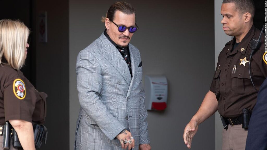 johnny-depp-channels-jack-sparrow-outside-of-courthouse
