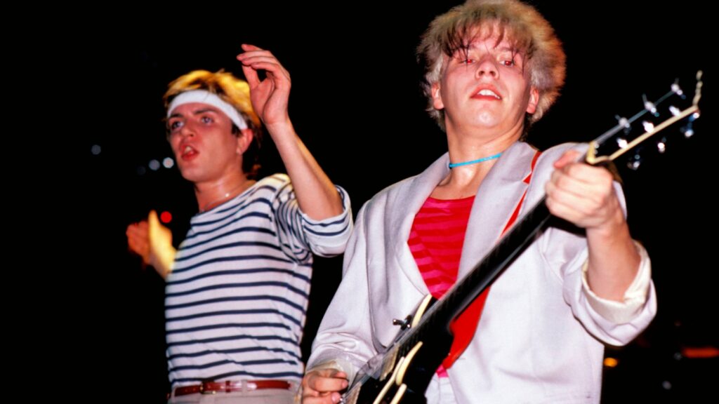 andy-taylor-reveals-stage-4-cancer-diagnosis-during-duran-duran’s-rock-hall-speech