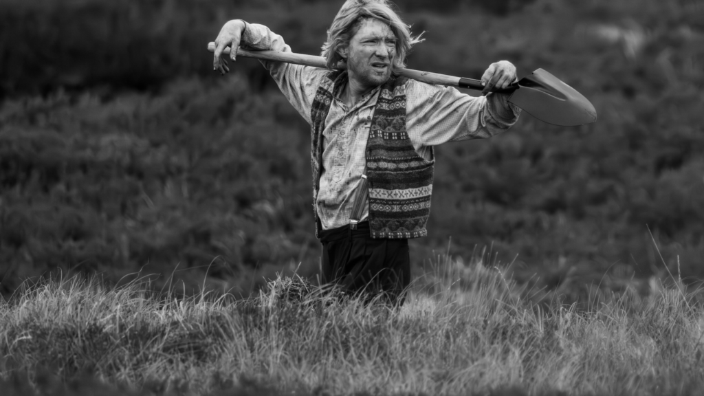 domhnall-gleeson-digs-his-own-grave-in-video-for-hozier’s-‘de-selby-(part-2)’