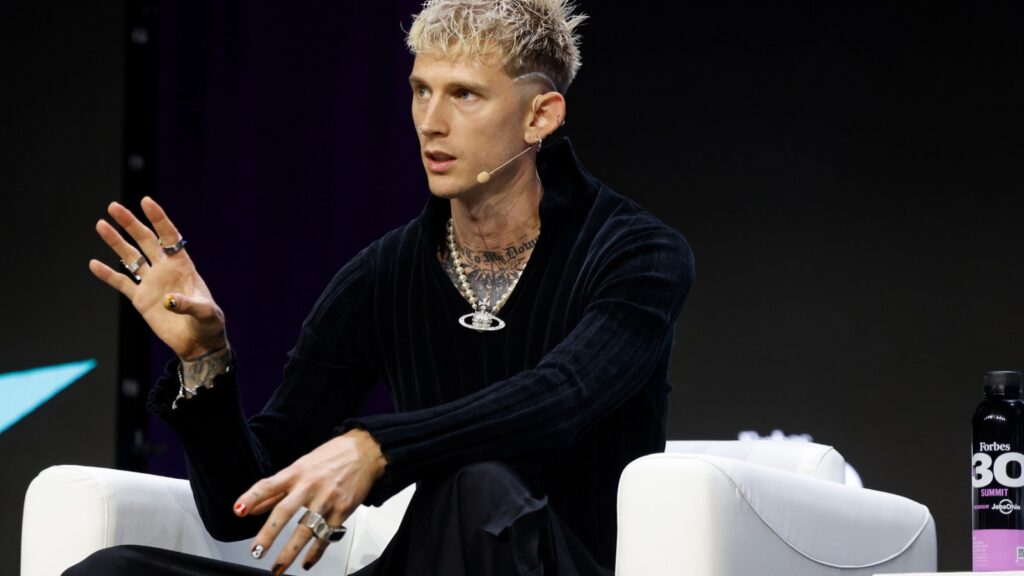 machine-gun-kelly-stops-stage-crasher-at-panel-event:-‘don’t-make-me-do-this’
