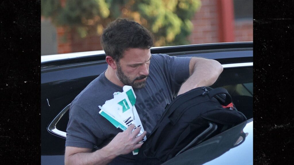 ben-affleck-pulls-out-carton-of-cigarettes-while-picking-up-kids