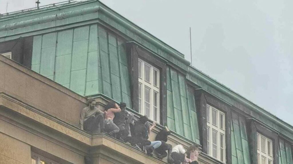 students-hang-off-edge-of-building-to-hide-from-gunman-in-prague-mass-shooting