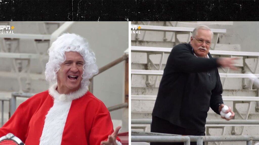 peyton-manning-dresses-up-as-santa,-gets-pelted-w/-snowballs-from-ricky-watters