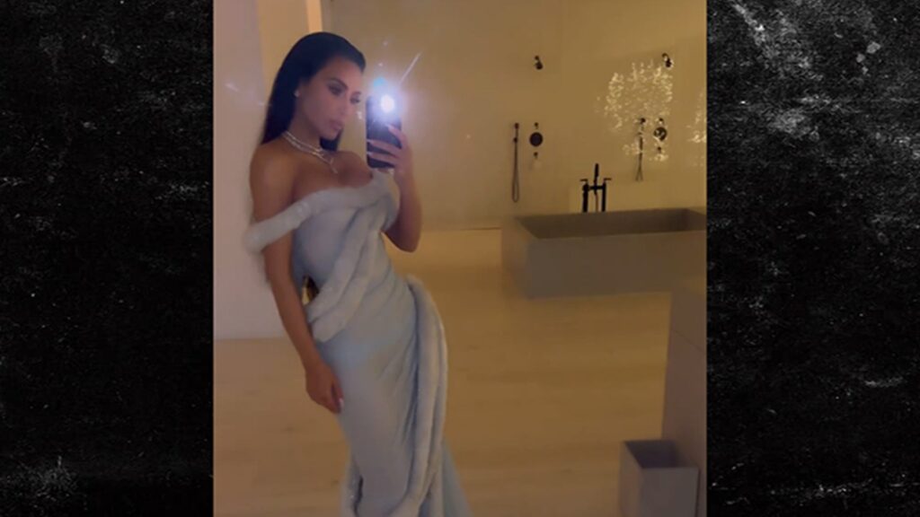 kim-kardashian-hosts-holiday-party-with-snow,-coke-and-gingerbread-house